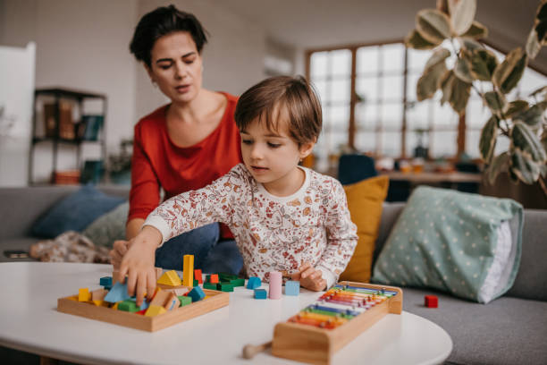 istock Daughter and mother playing 1354228860