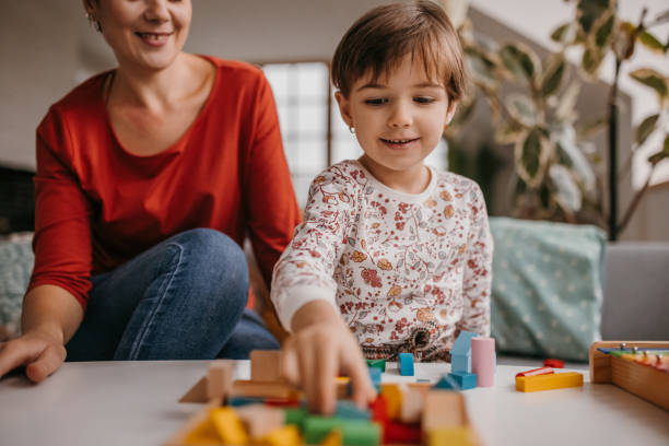 istock Daughter and mother playing 1354228879