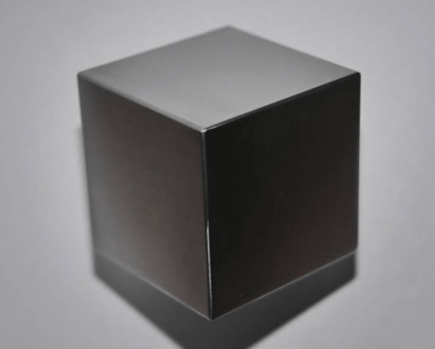 "Tungsten Cube" - Impression Close-up pictures of a tungsten cube - an incredibly dense metal, heavy as gold and uranium, and the cult object of the NFTs community tungsten metal stock pictures, royalty-free photos & images