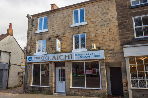 The Elaichi Indian Restaurant & Takeaway of Belper in Derbyshire, England, with contact details visible