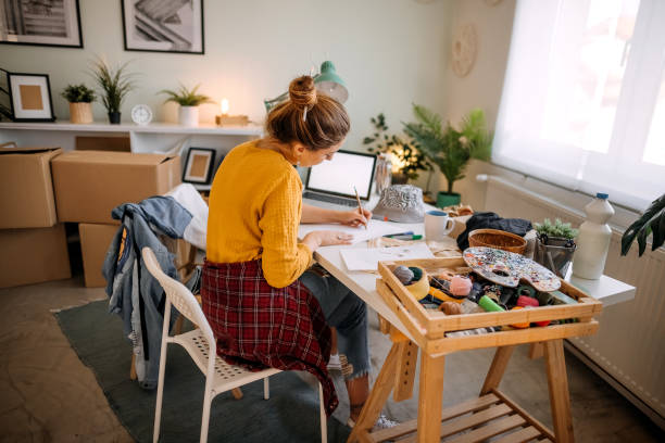 istock Young fashion designer working in office 1354234873