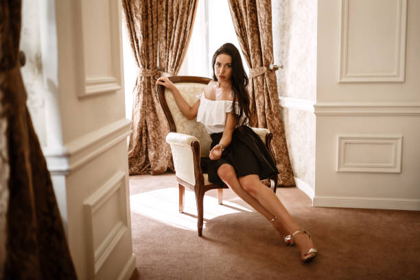 istock The alluring brunette in luxury interior. 1354235069
