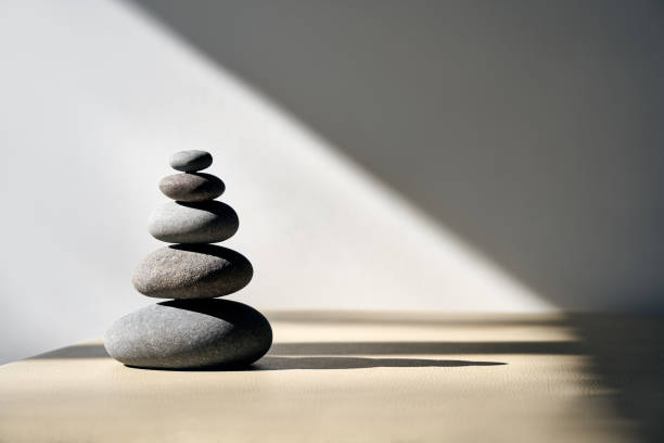 istock Pyramid of pebbles stones with copy space 1354238139