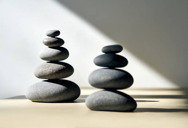 istock Pyramid of pebbles stones 1354238142
