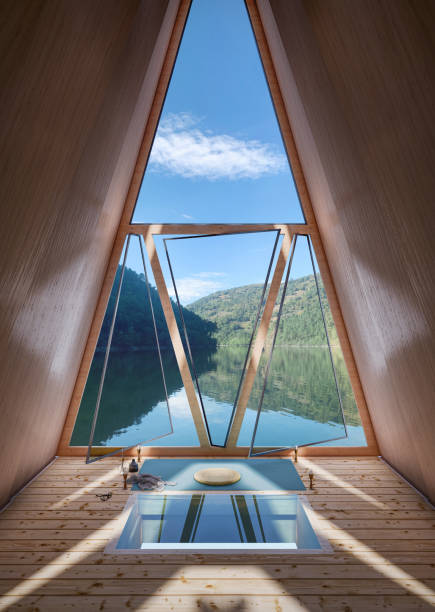 3d render of a beautiful lake view from a meditation cabin window Computer generated image of a triangle shaped meditation cabin with wooden flooring, a lake surrounded by mountains views from the window.  3d render of a beautiful lake view from a meditation cabin window. triangle building stock pictures, royalty-free photos & images