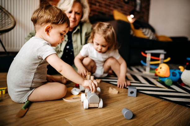 istock Grandma likes to play with us 1354242662