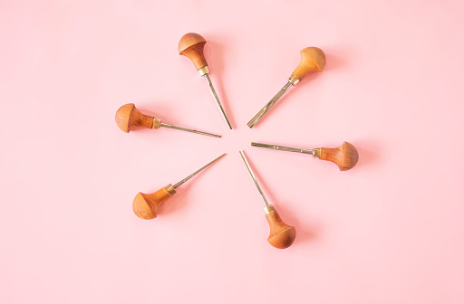 Woodcarving Tools On A Bright Pink Base