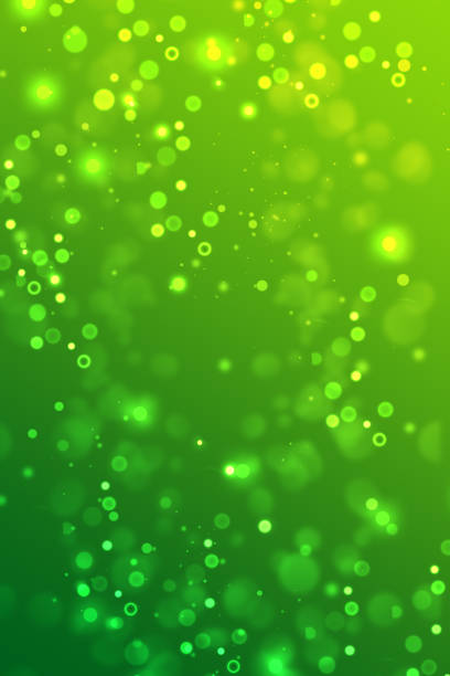 istock background with bokeh, abstract green background for design. green background with lights. 1354245158
