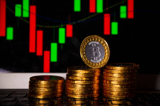 istock Bitcoin gold coin and defocused chart background. Virtual cryptocurrency concept. 1354253428
