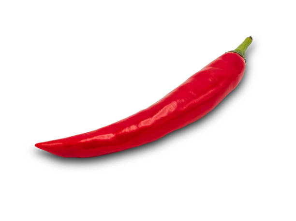 istock With clipping path, a red spicy chili pepper is isolated on a white background. 1354257694