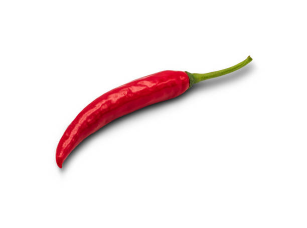 istock With a clipping path, a red spicy chili pepper is isolated on a white background. 1354257695