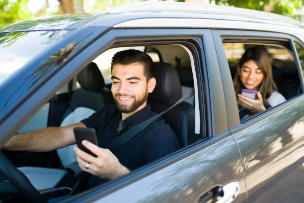 istock Happy man and woman on a carpool service 1354258400