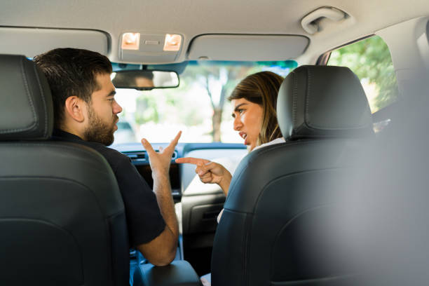 istock Angry man and woman during a long trip 1354259402