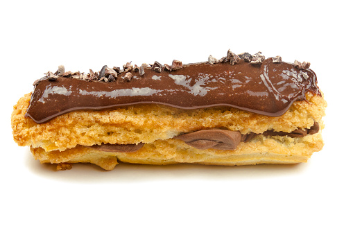 chocolate éclair on a white background
