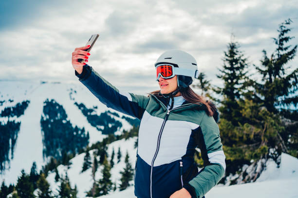 istock Woman skier taking selfie 1354262720