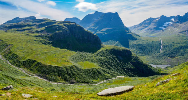 istock Mountain peak of Innerdalstarnet and Innerdalen Valley, Norway 1354264592