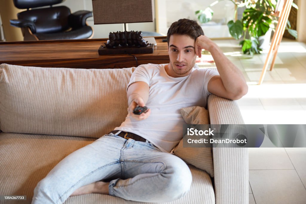 Man Using Remote Man Using Remote Controller Stock Photo - Download Image Now - Adult ...
