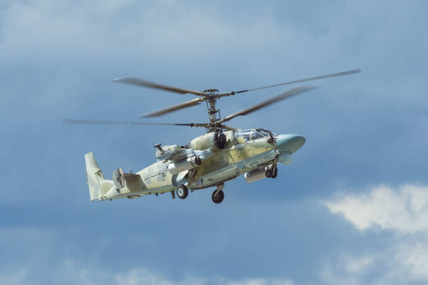 istock Helicopter gunship conducting high altitude training operations. 1354268989