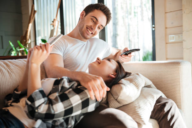 istock Man smiling to his woman 1354271177