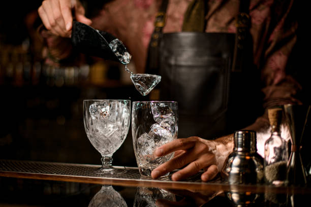 istock several crystal glasses in which poured ice cube from steel scoop 1354275045