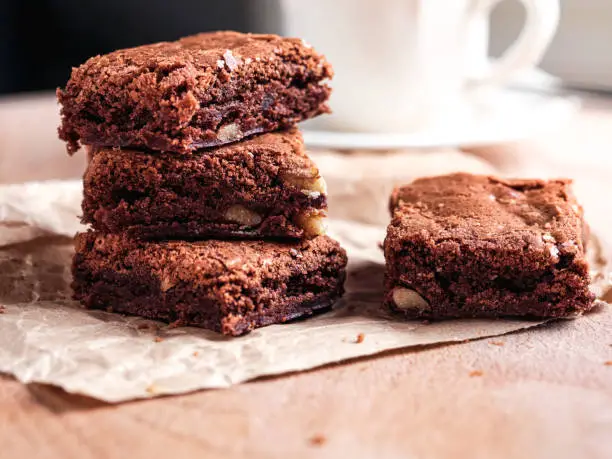 Photo of Coffe cup and brownies