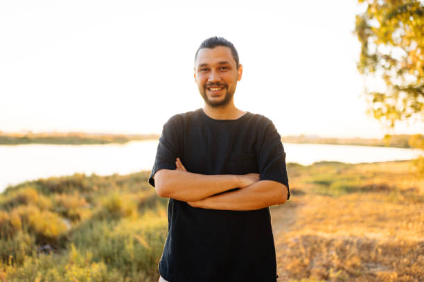 Portrait Of Young Handsome Man Smiling Outdoor