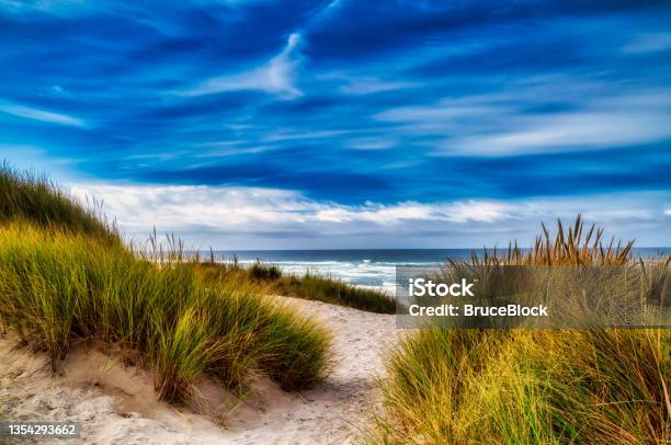 Beach Dunes And Clouds Stock Photo - Download Image Now - Sand Dune, Oregon - US State, Sea