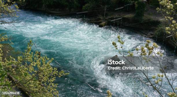 Fast Flowing Water At The Fontaine De Vaucluse Stock Photo - Download Image Now - Beauty, Color Image, Famous Place