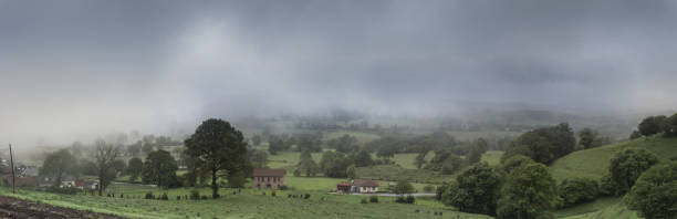 Clouds gripping the earth stock photo