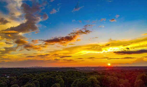 Glowing sunset with the Atlanta and Buckhead skyline on the horizon stock photo