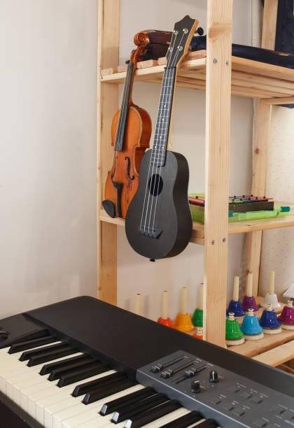 istock Shelf with musical instruments in montessori classroom 1354299955