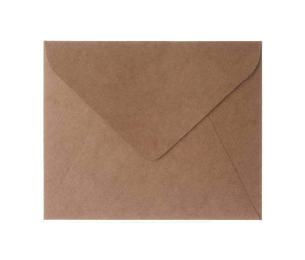 istock Brown paper envelope isolated on white. Mail service 1354303006