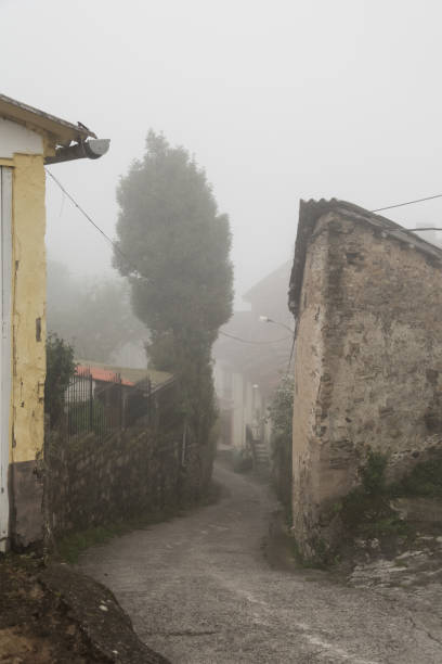 istock Small town streets in fog 1354306107