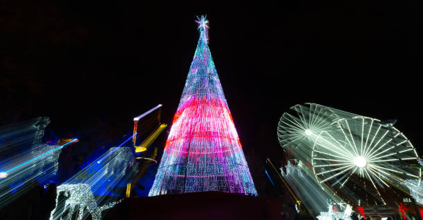 istock Christmas tree illuminated with colors.  Christmas decoration 1354307002