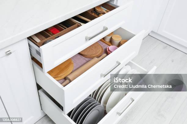 Open Drawers With Cutlery And Utensils Indoors Order In Kitchen Stock Photo - Download Image Now