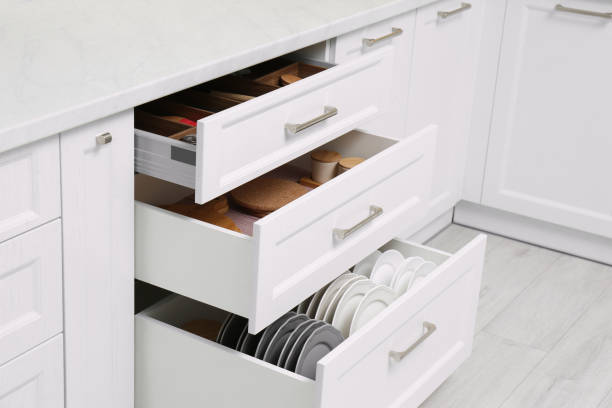 istock Open drawers with cutlery and utensils indoors. Order in kitchen 1354309313