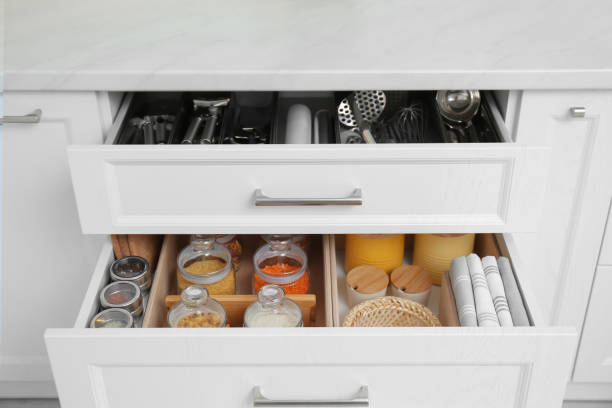 istock Open drawers with jars and utensils indoors. Order in kitchen 1354309913