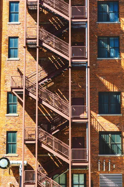 In Kansas City City Apartment Building Fire Escape Stairway Photo Series (Photos professionally retouched - Lightroom / Photoshop - downsampled as needed for clarity and select focus used for dramatic effect)