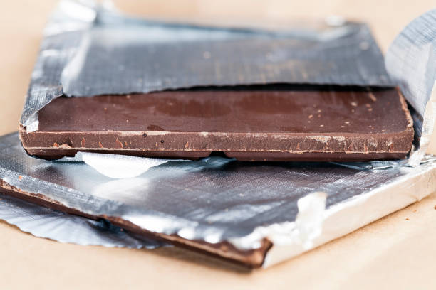 istock an old chocolate bar on which there are traces of human hands 1354314567