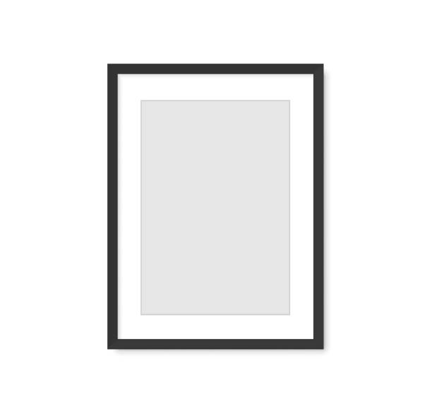 istock Photo picture frame on wall, vector white mockup or empty poster. Empty photo frame mockup for pictures or photograph, realistic 3D blank template 1354318805