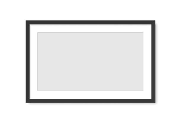 istock Photo picture frame on wall, vector white mockup or empty poster. Empty photo frame mockup for pictures or photograph, realistic 3D blank template 1354318869