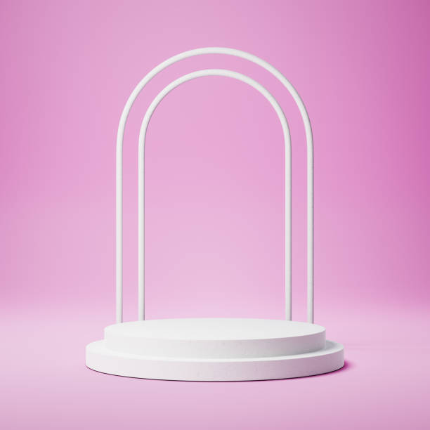 istock White Round Shaped Product Display Podium on Pink Background 1354327281