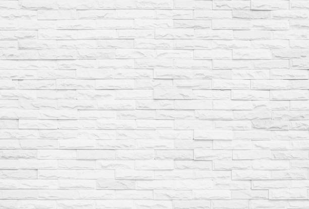 istock White grunge brick wall texture background for stone tile block painted in grey light color wallpaper modern interior and exterior and room backdrop design 1354329765