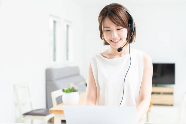 istock young asian woman studying with a laptop computer,correspondence course 1354332987