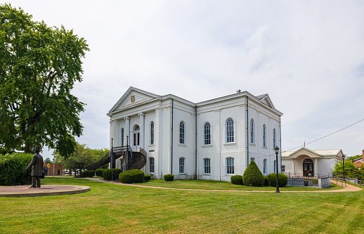 Mount Vernon, Illinois, USA - August 18, 2021: The Historic Appellate Courthouse with a statue of Abraham Lincoln