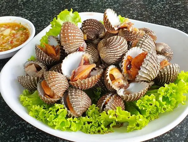 Cockles boiled with a spicy sour sauce