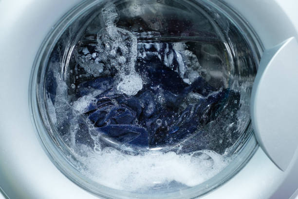 istock Linen washing in the washing machine. 1354342521