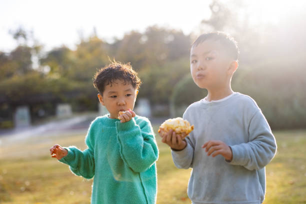 The children are eating bread