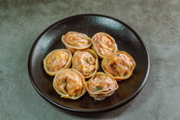 istock Korean style Dumplings made with a filling that includes kimchi. 1354354291
