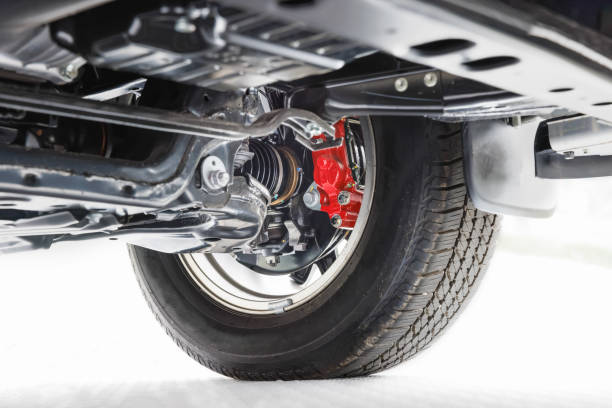 istock SUV car suspension and front drive shaft. 1354355279